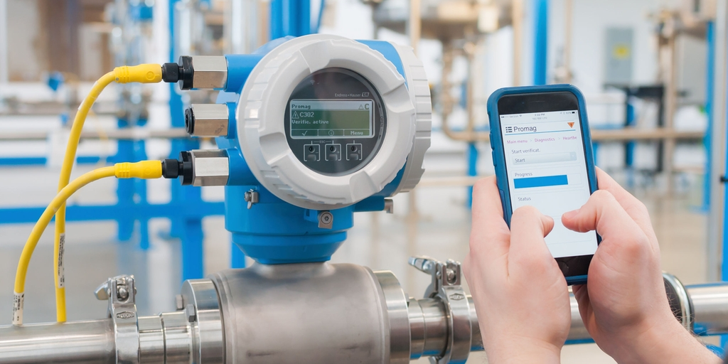 Endress Hauser flow meter installed in industrial pipeline for accurate measurement