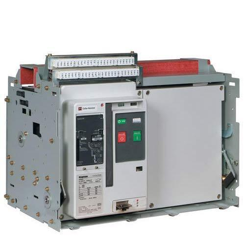 Engineer inspecting Eaton power management equipment in a commercial facility