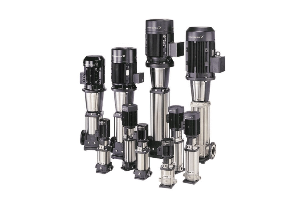 Engineer inspecting a Grundfos water pump for industrial applications